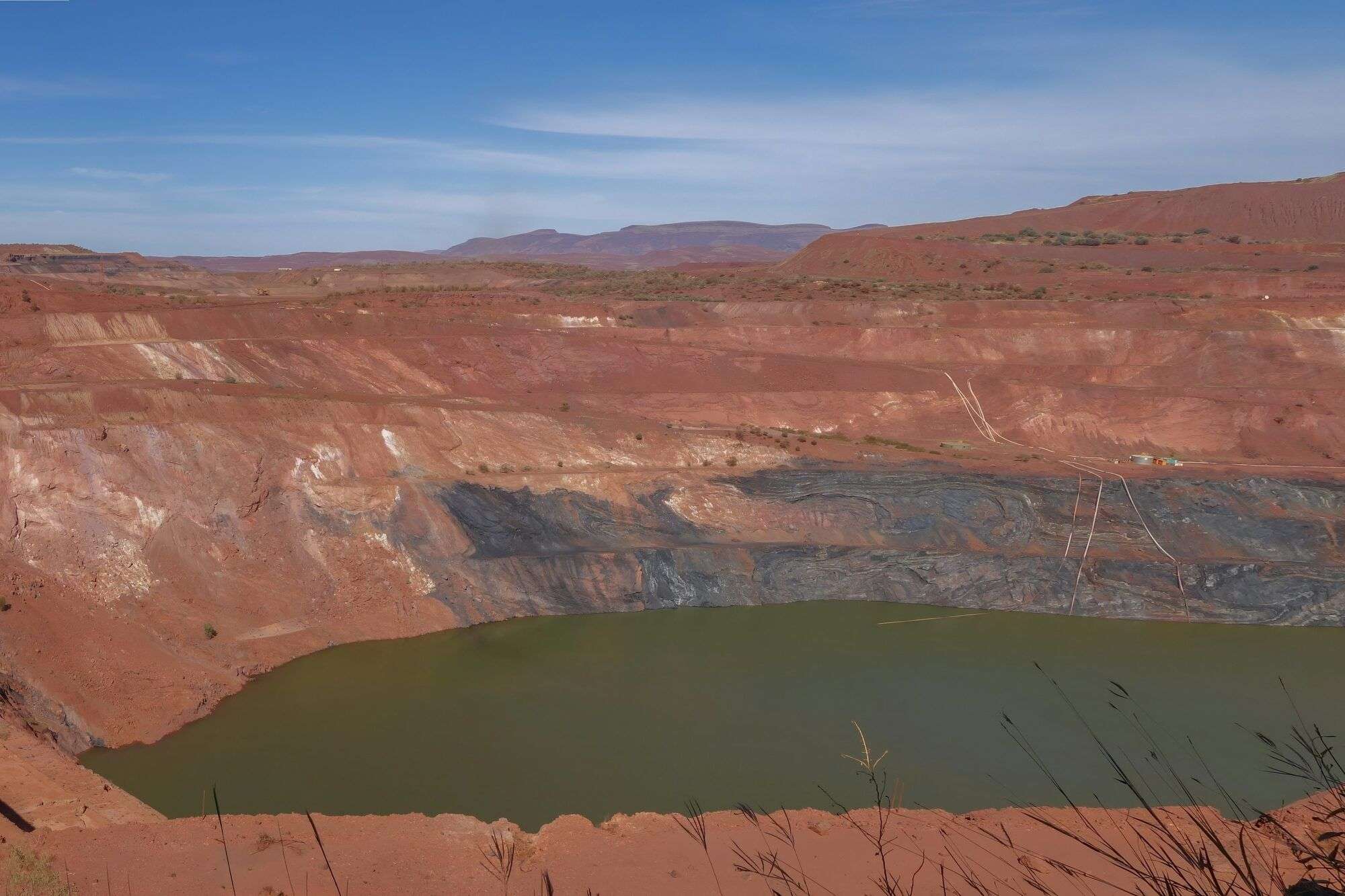 Water collected in the floor of an open pit, the type of inflow a dewatering pump removes