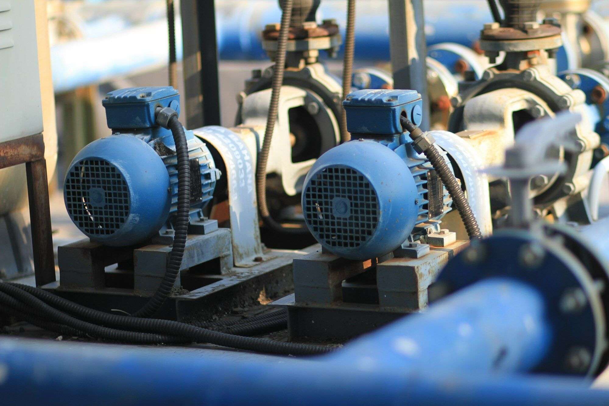 Pair of motor-driven centrifugal pumps on a skid with flanged water pipework